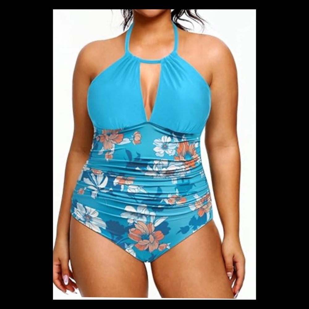 Blue top floral bottom one piece swimsuit.